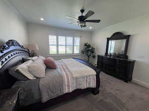 Bedroom featuring a ceiling fan, carpet floors, and recessed lighting