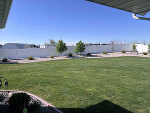 View of fenced backyard