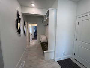 Mudroom featuring baseboards