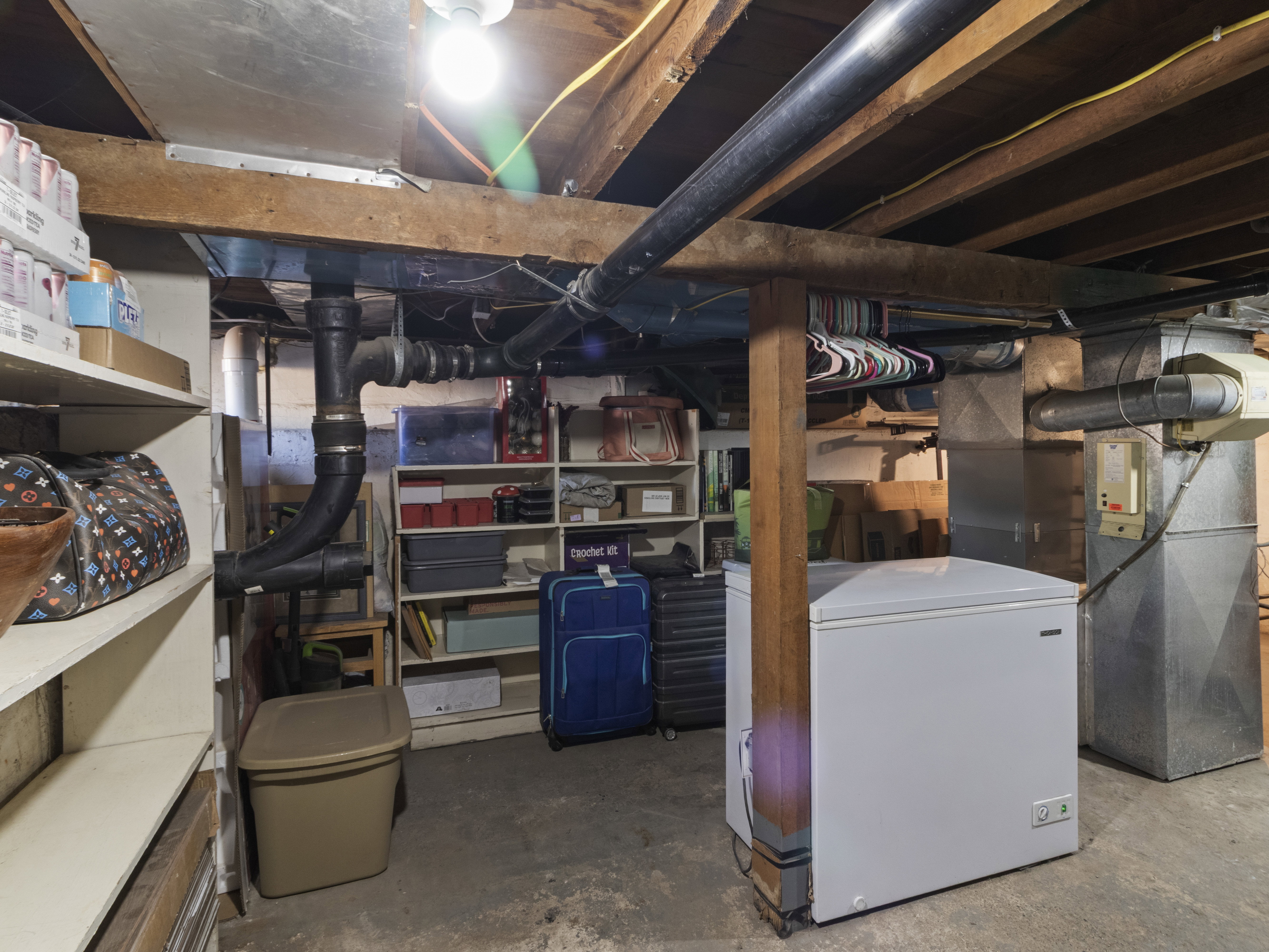 Unfinished basement with heating unit