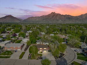 Aerial view at dusk of a mountain view and a residential view