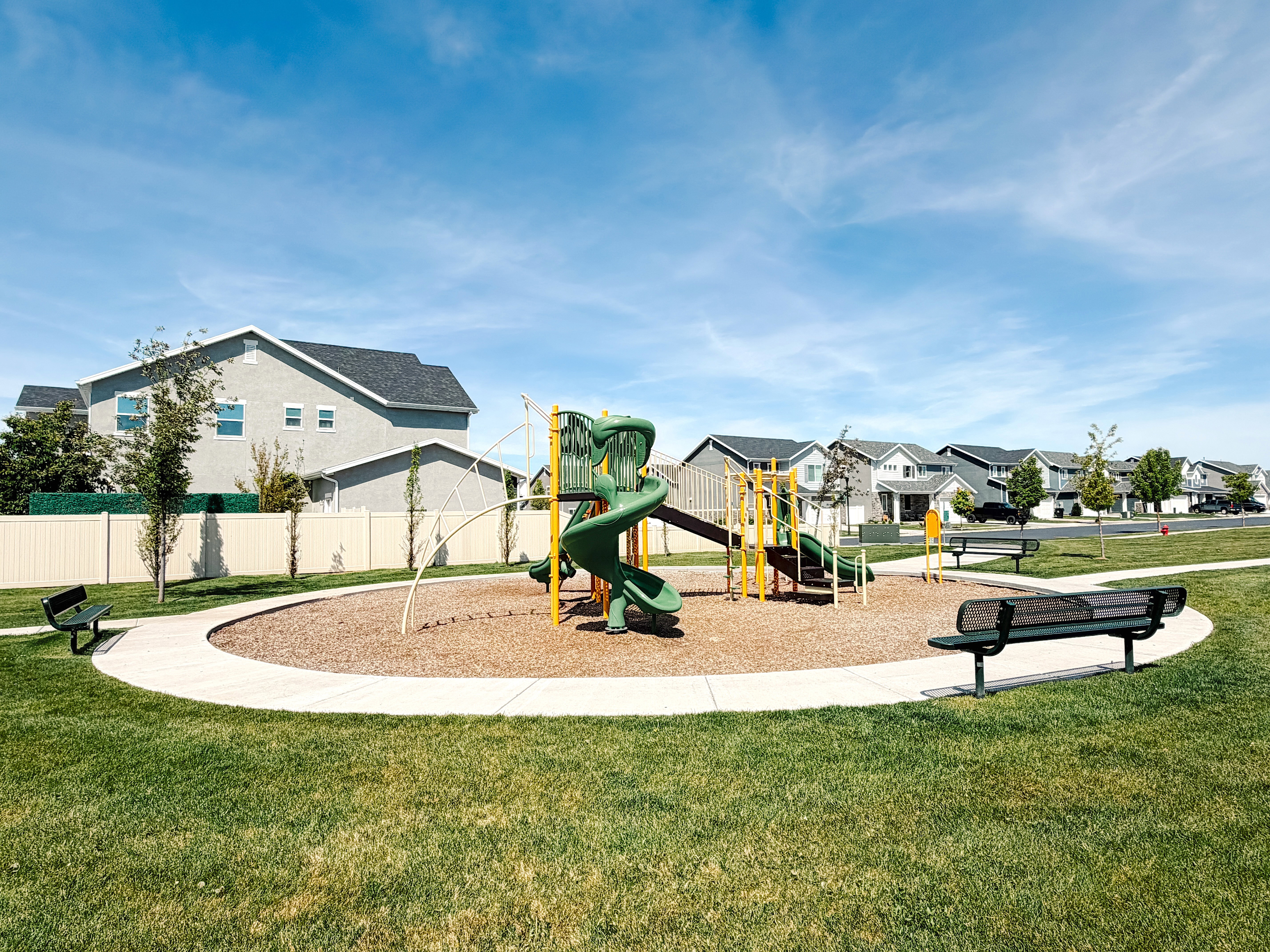 Community play area with a residential view