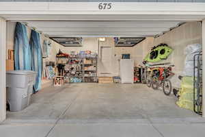 Organized garage with tons of upper storage included