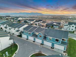 Aerial view at dusk of a residential view and a mountain view