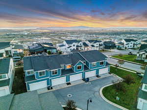 Aerial view at dusk of a residential view and a mountain view