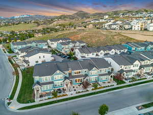 Aerial view at dusk of a mountain view and a residential view