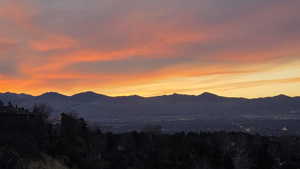 Panoramic Oquirrh Mountain sunsets and sweeping valley views create a truly unforgettable evening setting