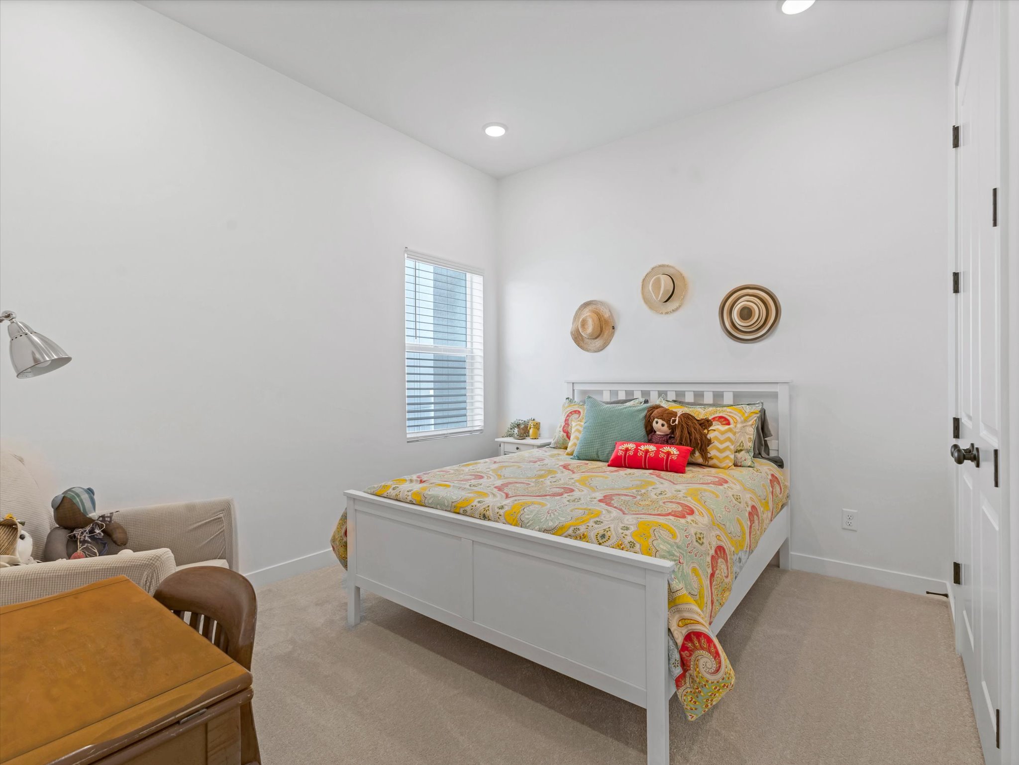Carpeted bedroom featuring baseboards and recessed lighting