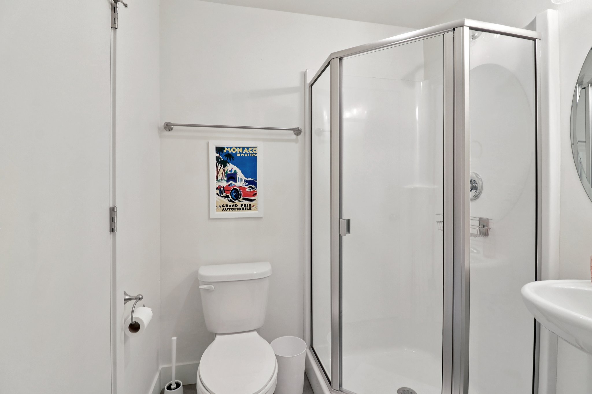 Full bath featuring toilet and a shower stall