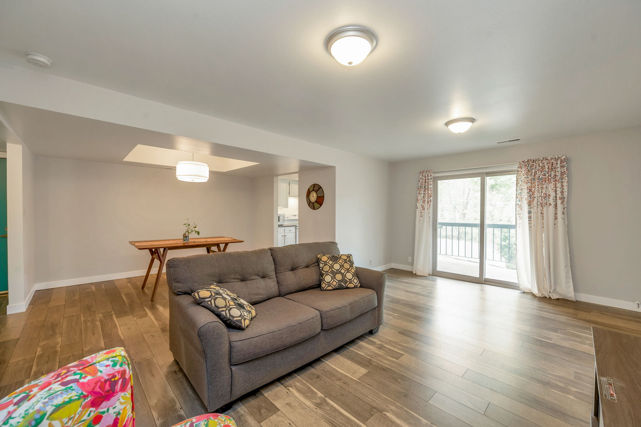 Living area with laminate wood-style floors