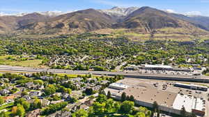 Aerial view of residential area featuring a mountain backdrop
