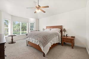 Expansive room featuring a bay window with multiple panes, providing natural illumination