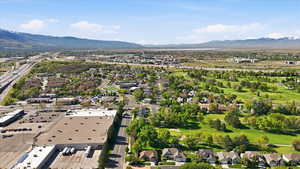 Aerial view of residential area with a mountainous background