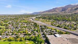 Aerial view of residential area with a mountain backdrop