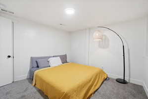 Bedroom featuring carpet flooring