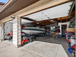 Garage featuring a garage door opener