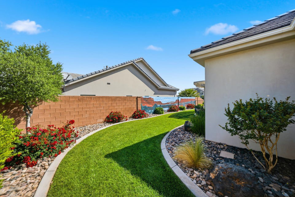 View of fenced backyard