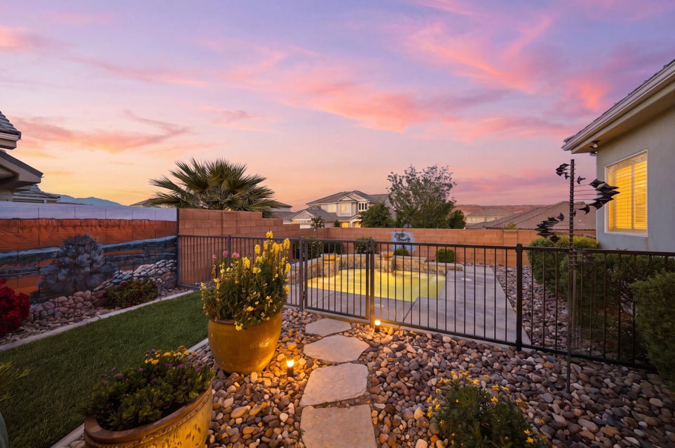 View of fenced backyard