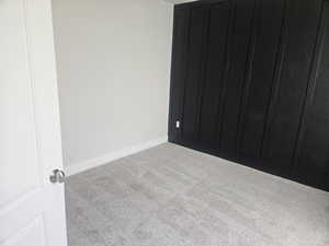 Spare room with carpet flooring