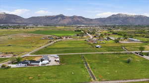 View of rural area with a mountain backdrop