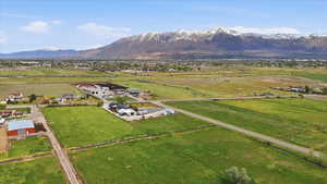 Aerial view of sparsely populated area featuring a mountainous background