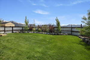 View of yard with a mountain view