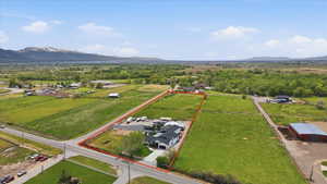 View of rural area featuring a mountainous background and property boundaries highlighted