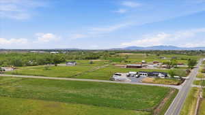 Aerial view of sparsely populated area featuring a mountain backdrop