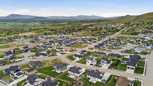 Aerial view of residential area with a mountainous background