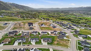 Aerial view of property's location with nearby suburban area