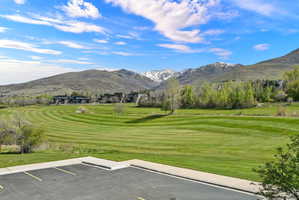 View of mountain backdrop with a local golf course
