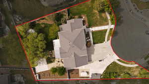 Aerial view of property and surrounding area with property boundaries highlighted