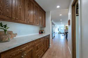 Hallway featuring recessed lighting and light wood finished floors