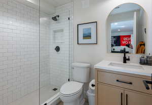 Full bath featuring vanity and walk in shower