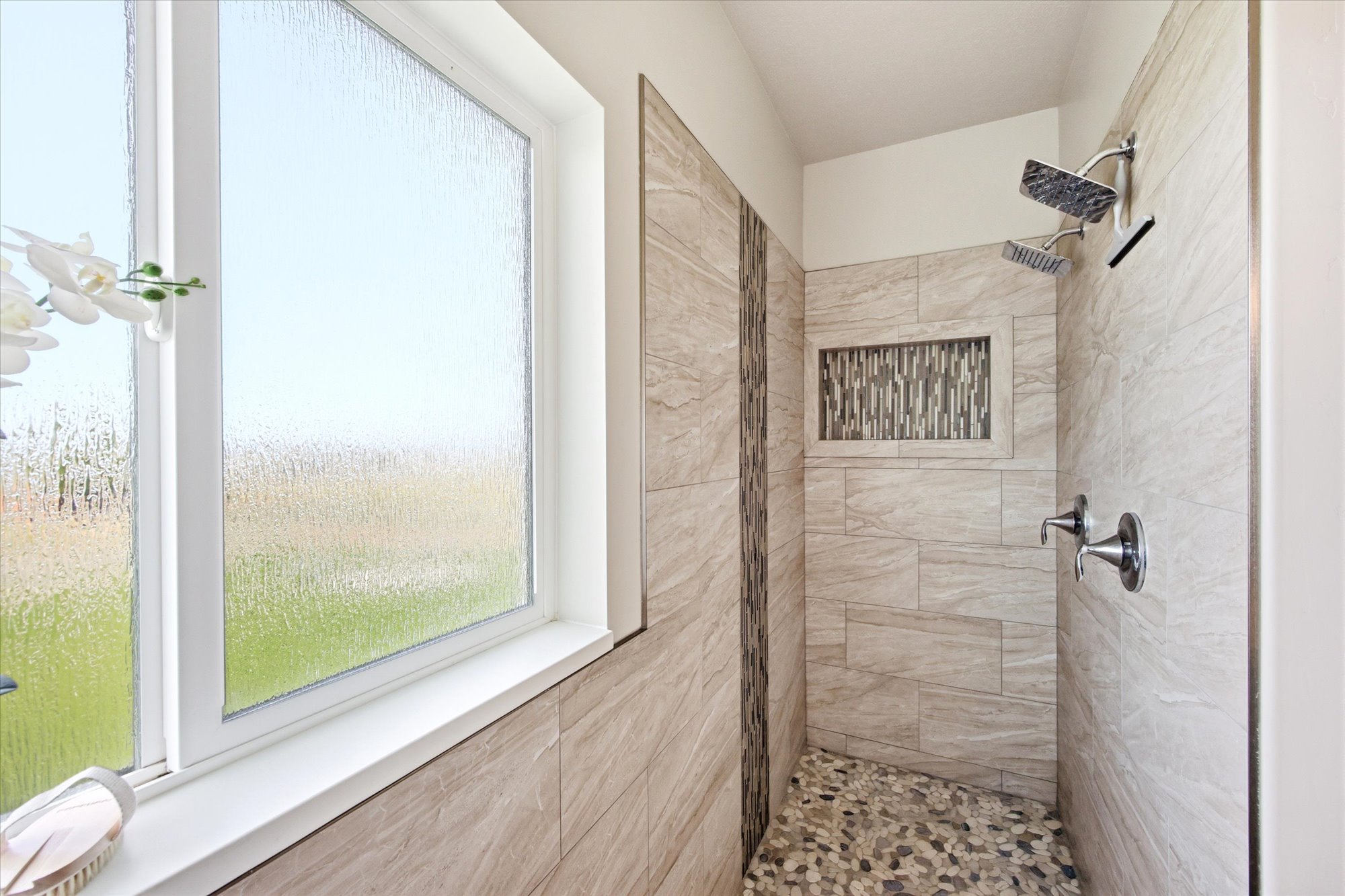 Bathroom with tiled shower