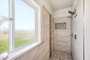 Bathroom with tiled shower