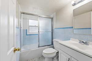 Full bath upstairs with adorable original tile