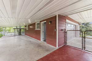View of patio / terrace with a gate