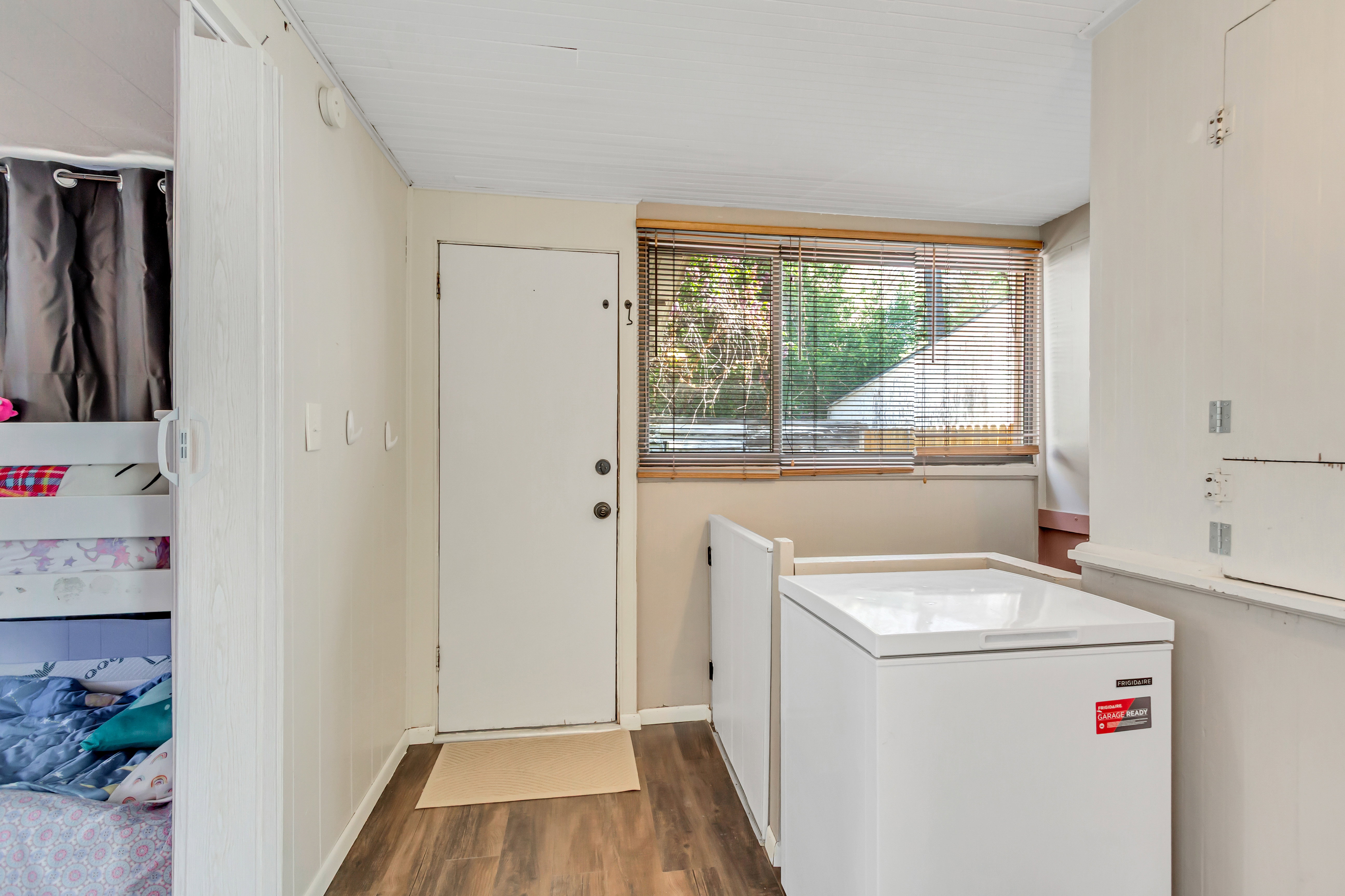 Backyard and basement access from kitchen