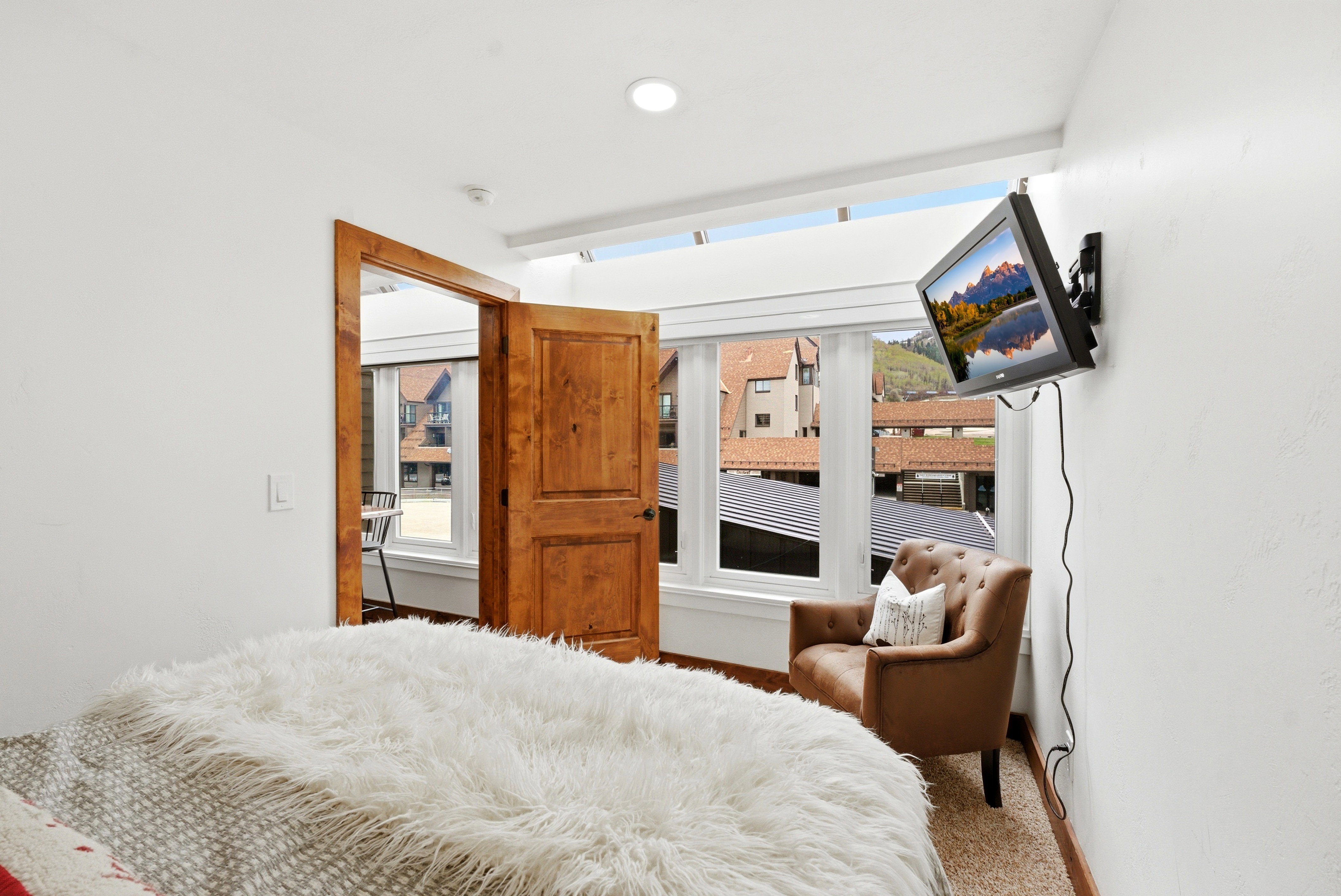 Carpeted bedroom featuring recessed lighting