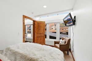 Carpeted bedroom featuring recessed lighting