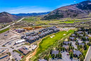 Aerial view of mountains and a golf club