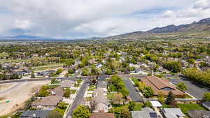 Aerial view of residential area featuring mountains