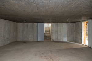 Unfinished below grade area with stairs