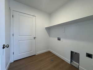 Laundry room with dark wood finished floors, hookup for an electric dryer, and hookup for a washing machine