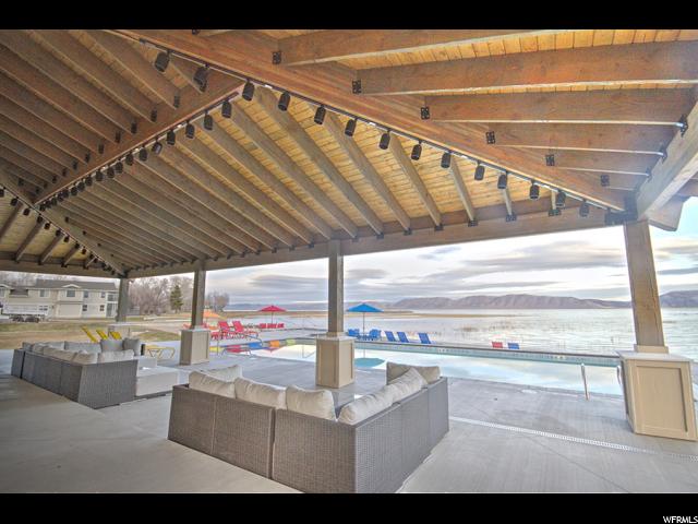 View of patio / terrace featuring a pool and an outdoor living space