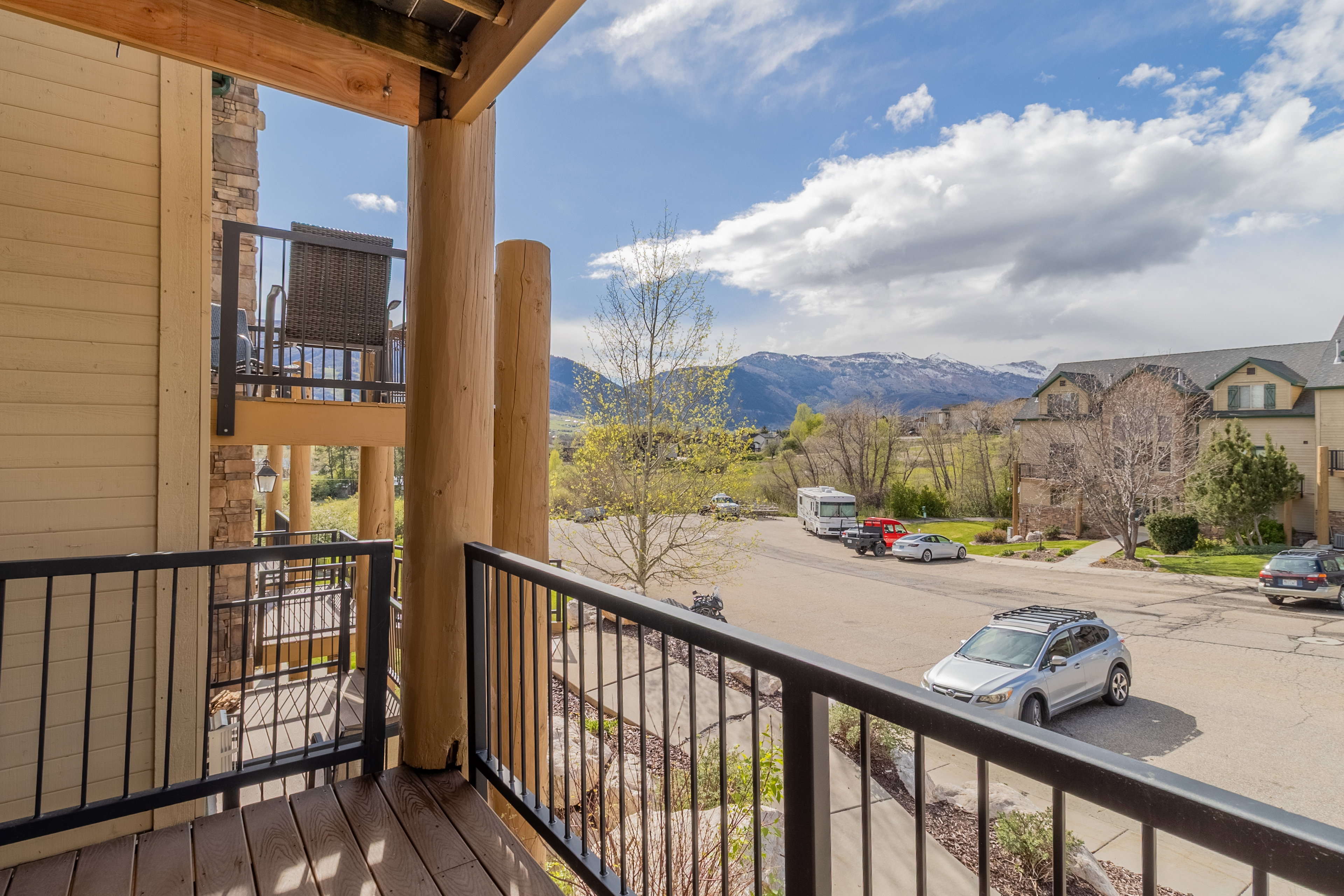 Balcony with a mountain view and a residential view