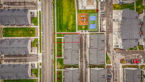 Aerial view of residential area with property boundaries highlighted