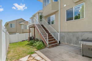 Doorway to property with stucco siding