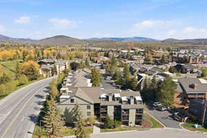 Aerial perspective of suburban area with mountains